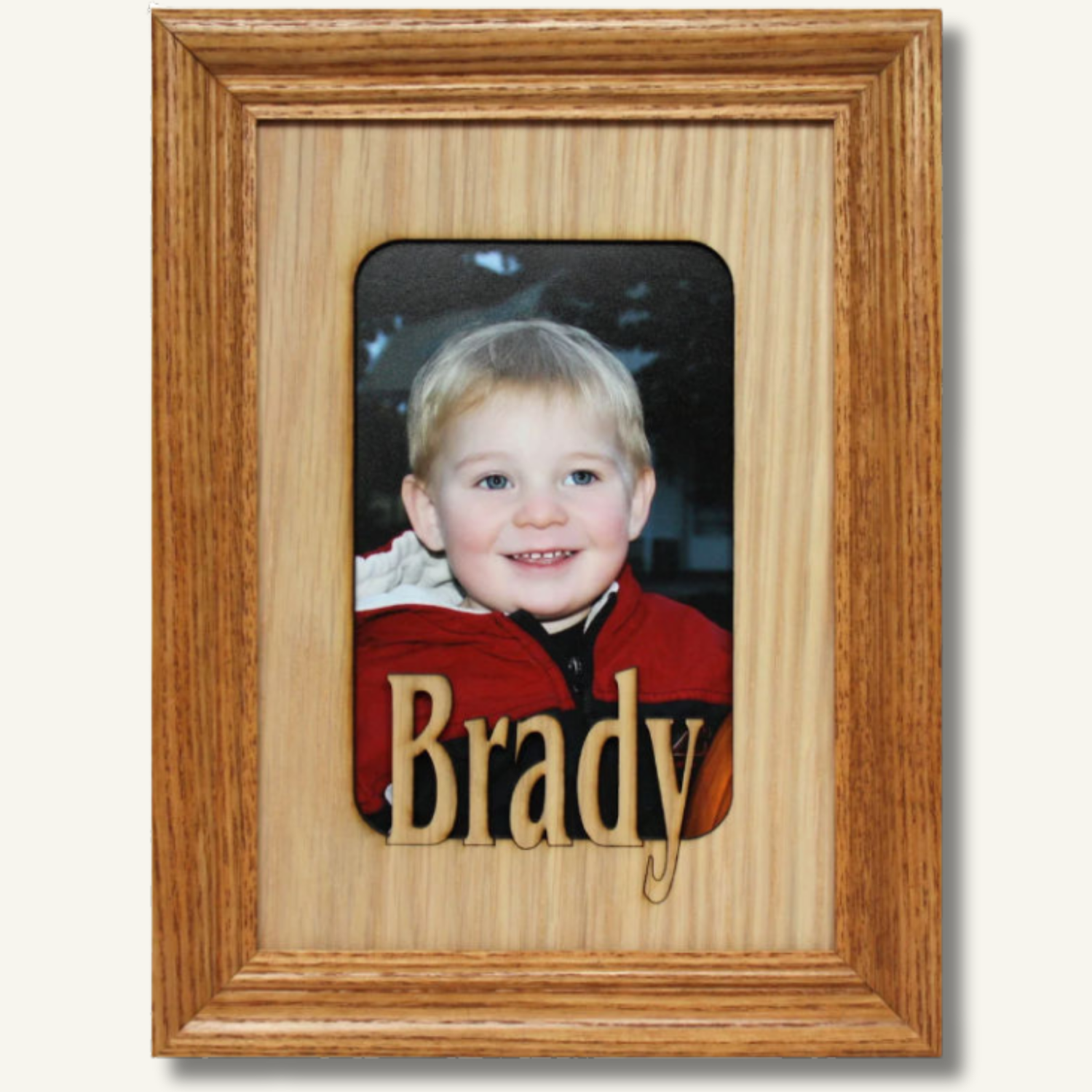 Custom wooden name frames with laser-cut personalization, designed to hold cherished photos and highlight names in unique engraved lettering
